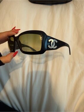 CHANEL Black Sunglasses with Silver CC Logo and Greenish Lenses